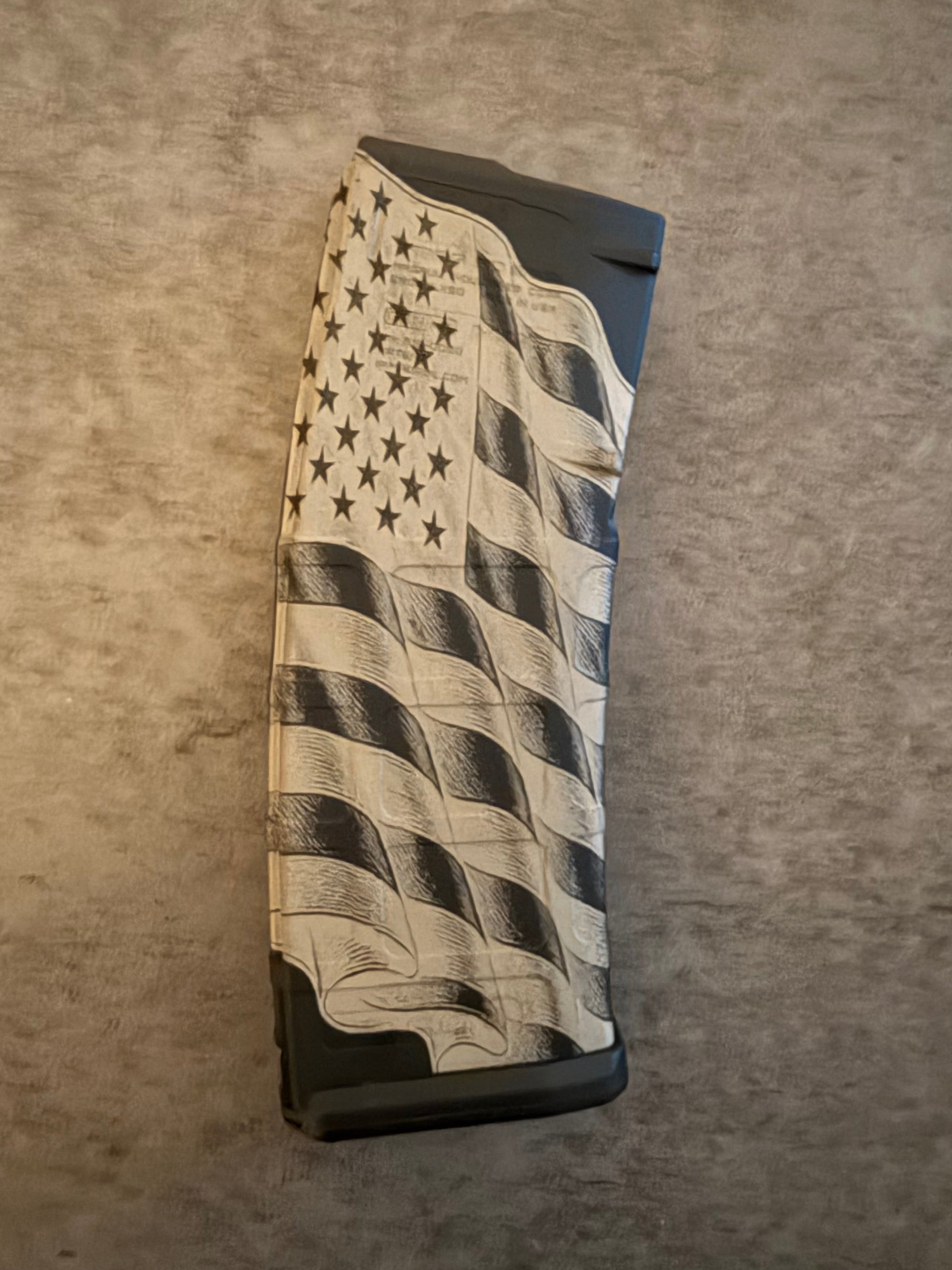 Guns magazine with American flag design on a textured surface